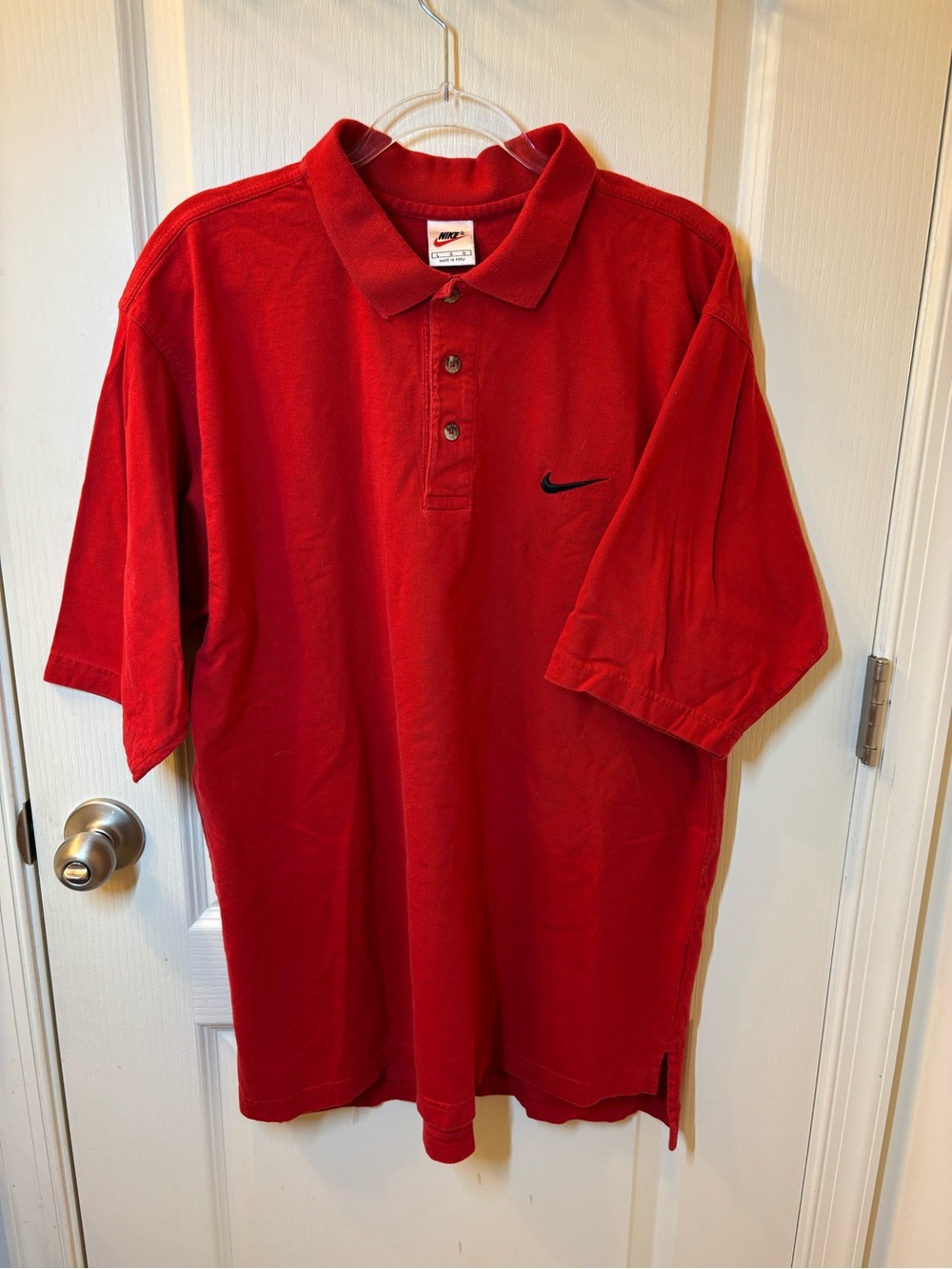 Red Nike polo shirt with black swoosh 90’s